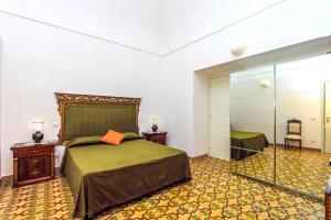 Кровать или кровати в номере Amalfi Antica