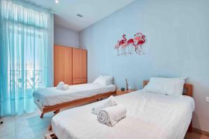 Postel nebo postele na pokoji v ubytování Luxury Apartment Joliette