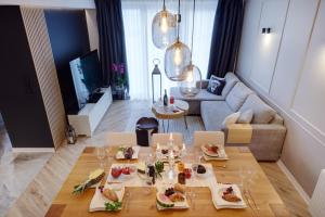 Posedenie v ubytovaní Apartament Heaven-2 poziomowy elegancki z wanna w pokoju