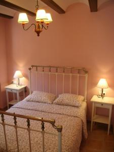 Cama o camas de una habitación en Apartamentos Cine Capicol