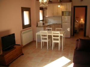 Una cocina o zona de cocina en Apartamentos Cine Capicol