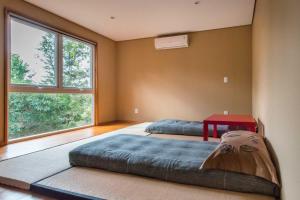 Postel nebo postele na pokoji v ubytování Baubrasil Village + 48 fotografií