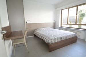 Postel nebo postele na pokoji v ubytování La Costa di Alex