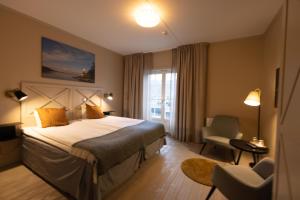 Postel nebo postele na pokoji v ubytování Åtellet Hotell