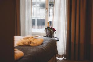 Postel nebo postele na pokoji v ubytování Åtellet Hotell