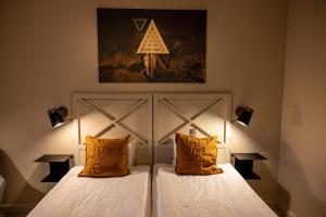 Postel nebo postele na pokoji v ubytování Åtellet Hotell