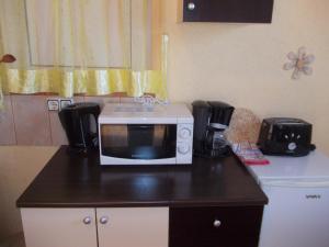 Kuchyň nebo kuchyňský kout v ubytování Apartments Pavlić