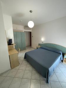 Postel nebo postele na pokoji v ubytování Albergo Désirée 2