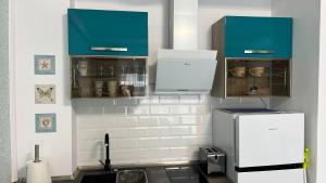 Køkken eller tekøkken på Mamaia Nord-Casa del Mar85 + 8 billeder