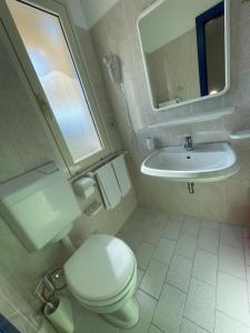 Koupelna v ubytování Albergo Désirée