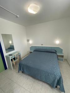 Postel nebo postele na pokoji v ubytování Albergo Désirée