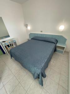Postel nebo postele na pokoji v ubytování Albergo Désirée