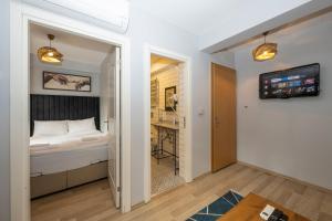 Postel nebo postele na pokoji v ubytování Dorne Suite Taksim Hotel