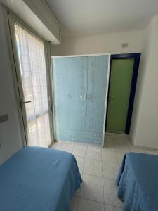 Postel nebo postele na pokoji v ubytování Albergo Désirée