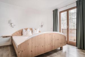 Łóżko lub łóżka w pokoju w obiekcie Haus Bambi