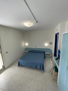 Postel nebo postele na pokoji v ubytování Albergo Désirée