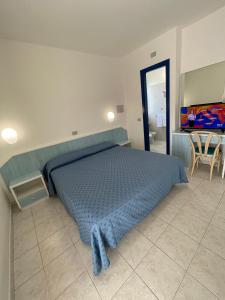 Postel nebo postele na pokoji v ubytování Albergo Désirée