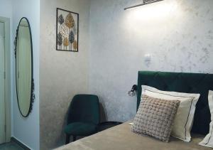 Krevet ili kreveti u jedinici u okviru objekta Aster Apartments