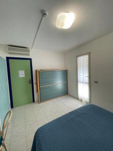 Postel nebo postele na pokoji v ubytování Albergo Désirée