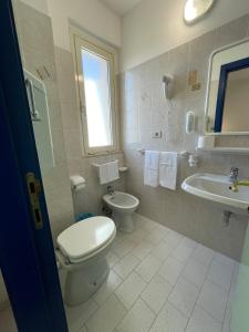 Koupelna v ubytování Albergo Désirée