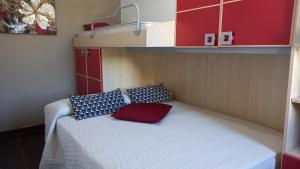 A bed or beds in a room at Villa Lilium