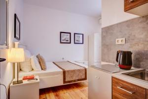 A kitchen or kitchenette at Just Studios