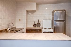 A kitchen or kitchenette at Just Studios