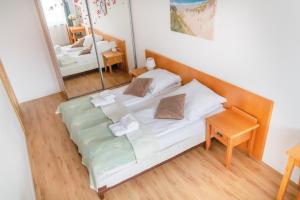 Posteľ alebo postele v izbe v ubytovaní AL-DOM apartamenty Blue Olymp 203 + 31 fotografií