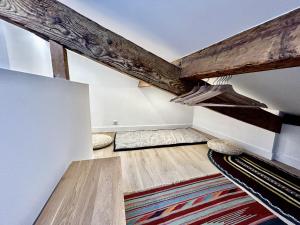 Posteľ alebo postele v izbe v ubytovaní Nice Chateau Duplex Menica vue sur le vieux Nice