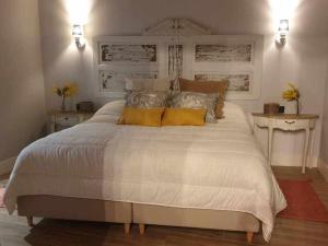 Łóżko lub łóżka w pokoju w obiekcie Precioso Apartamento 2 Hab con Bañera Hidromasaje