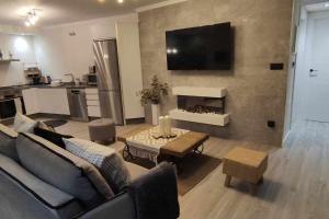 Kuchyňa alebo kuchynka v ubytovaní Precioso Apartamento 1 Hab con Bañera Hidromasaj