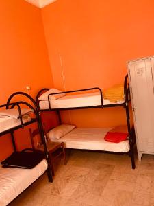 Postel nebo postele na pokoji v ubytování Dama HostelBB