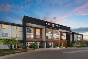 a rendering of a building with a courtiew no hospital at Courtyard by Marriott Dallas Lewisville in Lewisville