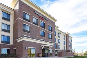 a rendering of the front of a building at TownePlace Suites by Marriott Detroit Commerce in Walled Lake