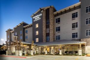 a rendering of the front of the hampton inn suites durhamatown at TownePlace Suites Midland South/I-20 in Midland