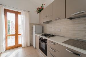 Kuchyň nebo kuchyňský kout v ubytování Casa Francesca a Rio - Goelba