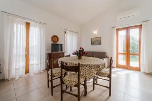 TV a/nebo společenská místnost v ubytování Casa Francesca a Rio - Goelba