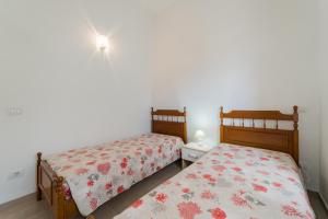 Postel nebo postele na pokoji v ubytování Casa Francesca a Rio - Goelba