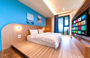 Lova arba lovos apgyvendinimo įstaigoje 漫遊小旅泳池溫泉宅 Roaming Travel Hot Spring Homestay