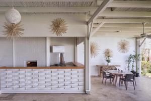 a dining room with a table and chairs at Prive Hotel Bodrum - Adult Only in Bodrum City