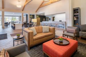 a living room with a couch and a table at Residence Inn Bozeman in Bozeman