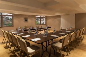 a large conference room with a long table and chairs at Prive Hotel Bodrum - Adult Only in Bodrum City