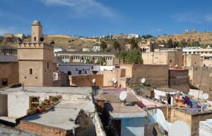 an aerial view of a city with buildings at Dar El Arfaoui in Fez