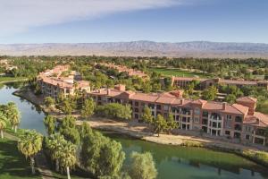 an aerial view of a resort with a river and trees at Marriott's Shadow Ridge II - The Enclaves in Palm Desert