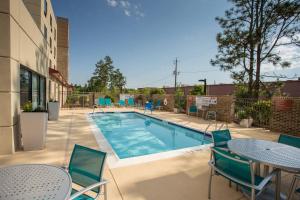 The swimming pool at or close to TownePlace Suites by Marriott Southern Pines Aberdeen