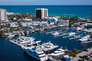 a group of boats docked in a harbor at Courtyard by Marriott Fort Lauderdale Beach in Fort Lauderdale