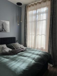 Кровать или кровати в номере Villa Bagatelle