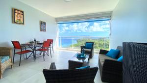 Bild i bildgalleri på Le Marmoris, Anse Mitan, Superbe T2 neuf, sublime vue mer i Les Trois-Îlets