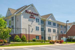 a building with a sign on the side of it at Residence Inn Waynesboro in Waynesboro