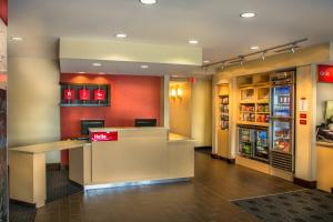 a lobby of a fast food restaurant with a counter at TownePlace Suites by Marriott Goldsboro in Goldsboro